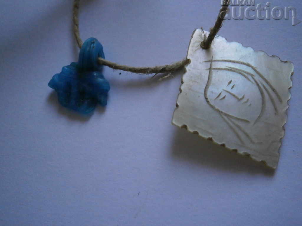 Auction Revival mother of pearl with a blue bead Auction Revival mother of pearl with a blue bead