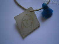 Revival mother of pearl with a blue bead