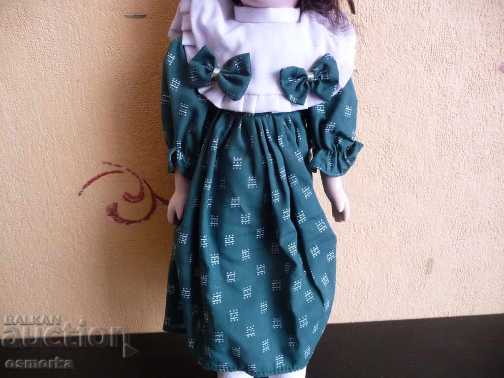Auction Porcelain doll with green dress and ribbons cool Auction Porcelain doll with green dress and ribbons cool