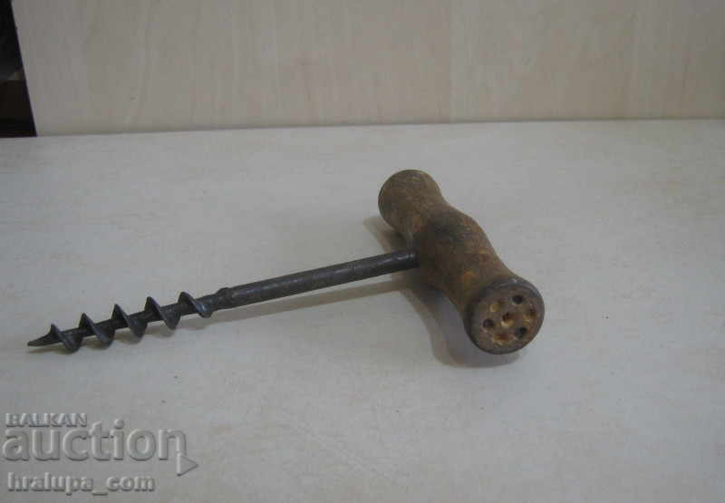 Auction An old antique corkscrew Auction An old antique corkscrew