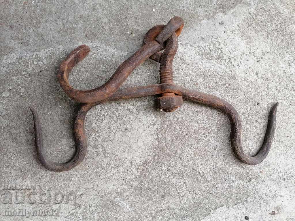 Delivery of An old forged scraping hook, double twin Delivery of An old forged scraping hook, double twin
