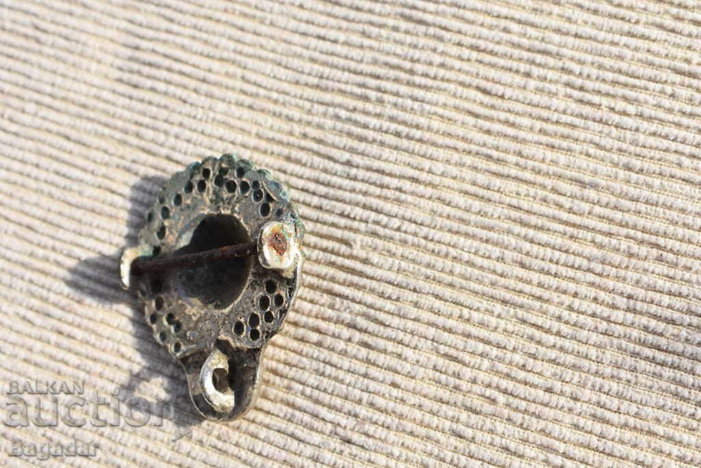 Licitație O parte din cataramă fixează cureaua cu cataramă