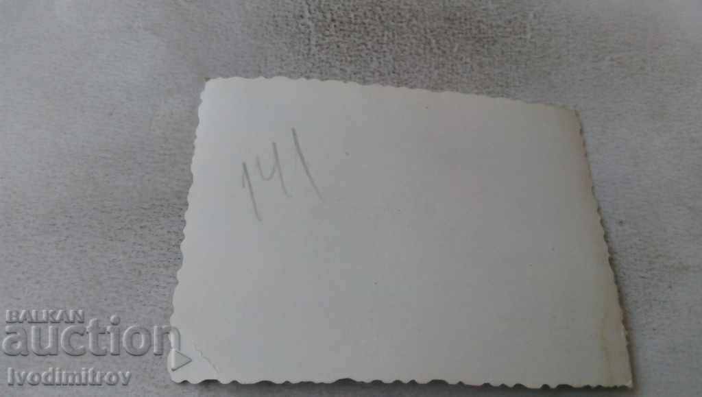 Photo Men in shorts and two women by the river with price 1.45 BGN | € 0.74