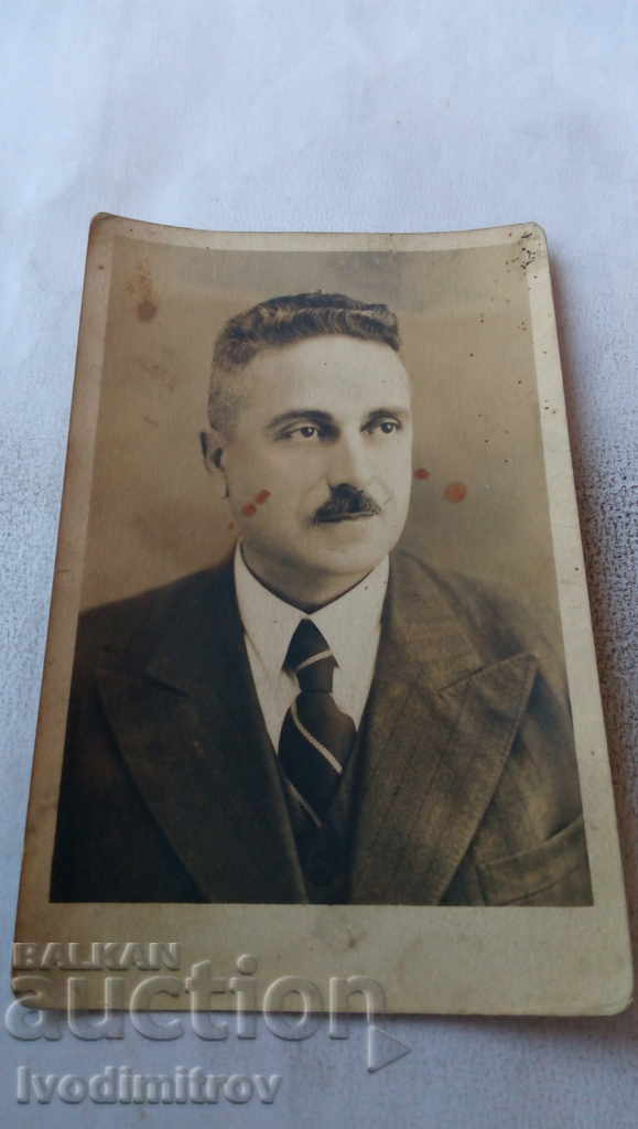 Photo of a man with a mustache
