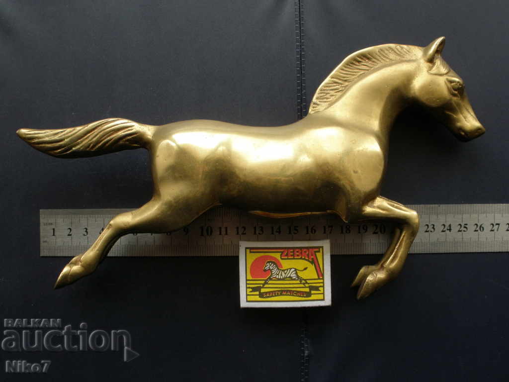 Auction Massive brass horse from a fireplace clock. Auction Massive brass horse from a fireplace clock.