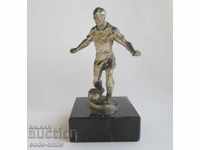 Old football figure statuette football player