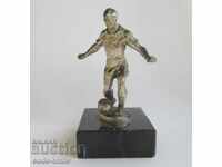 Old football figure statuette football player