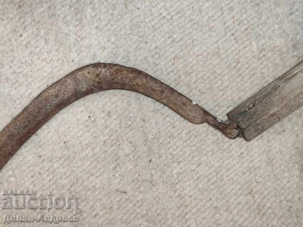 Auction An old sickle Auction An old sickle
