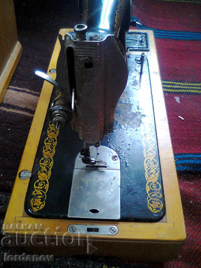 An old sewing machine. - 6 An old sewing machine. - 6