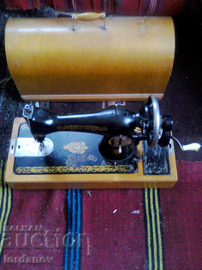 An old sewing machine. - 7 An old sewing machine. - 7