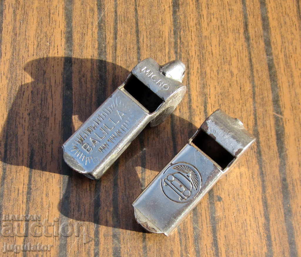 lot of two old metal sports and police whistles