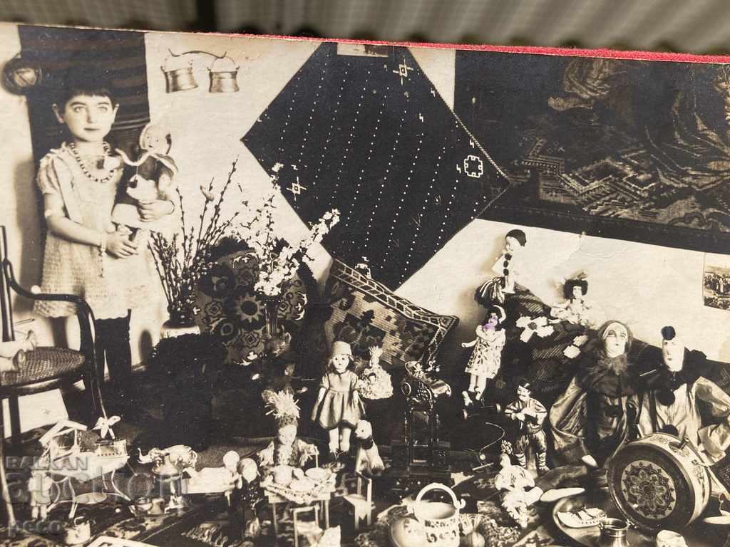 Auction Pleven 1930. A child in a room full of dolls Auction Pleven 1930. A child in a room full of dolls