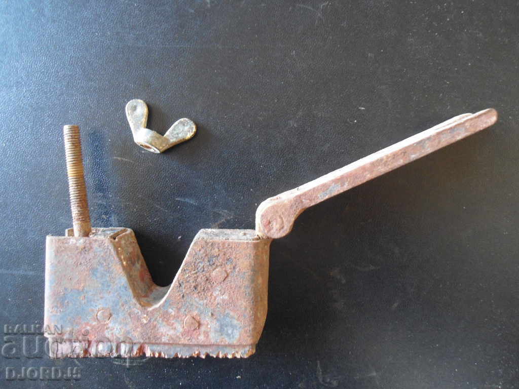 Auction  Old pipe clamp