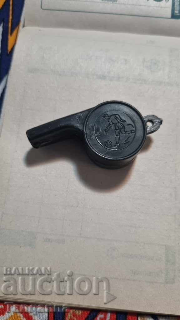 Old plastic whistle