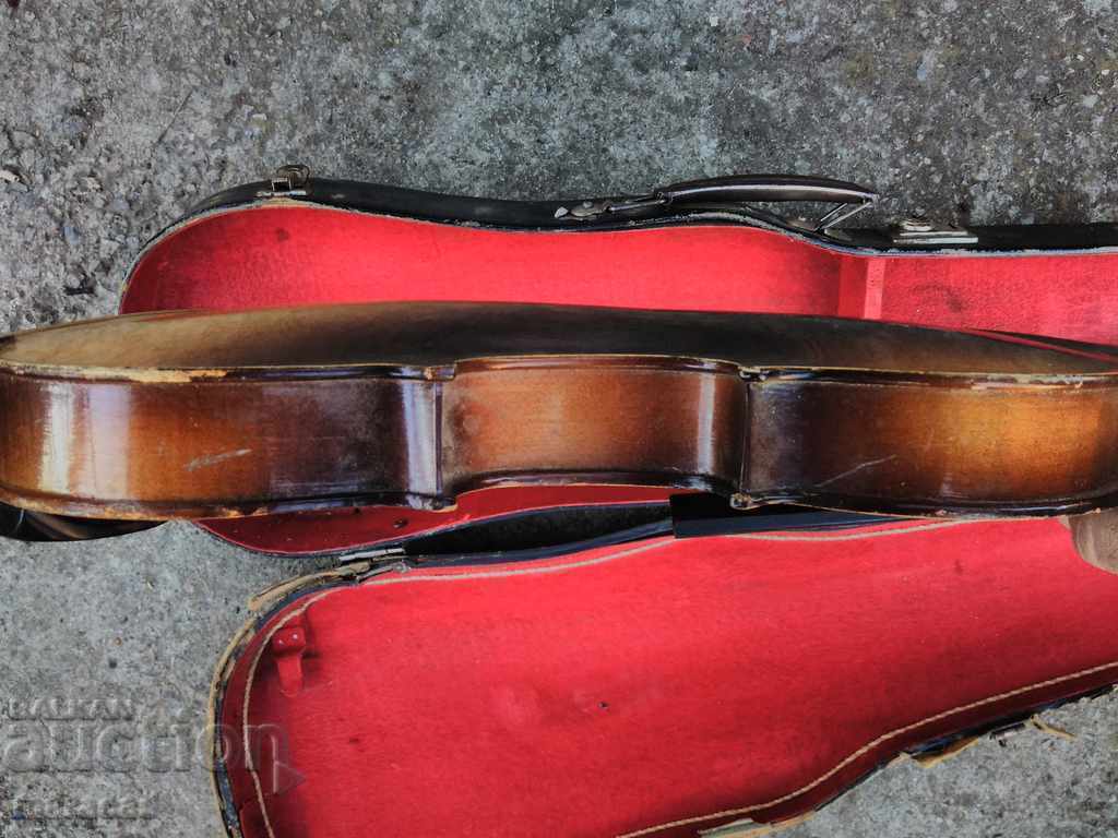 Auction  An old violin