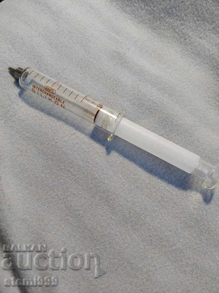 Old glass syringe with price 4.00 BGN | € 2.05 Old glass syringe with price 4.00 BGN | € 2.05