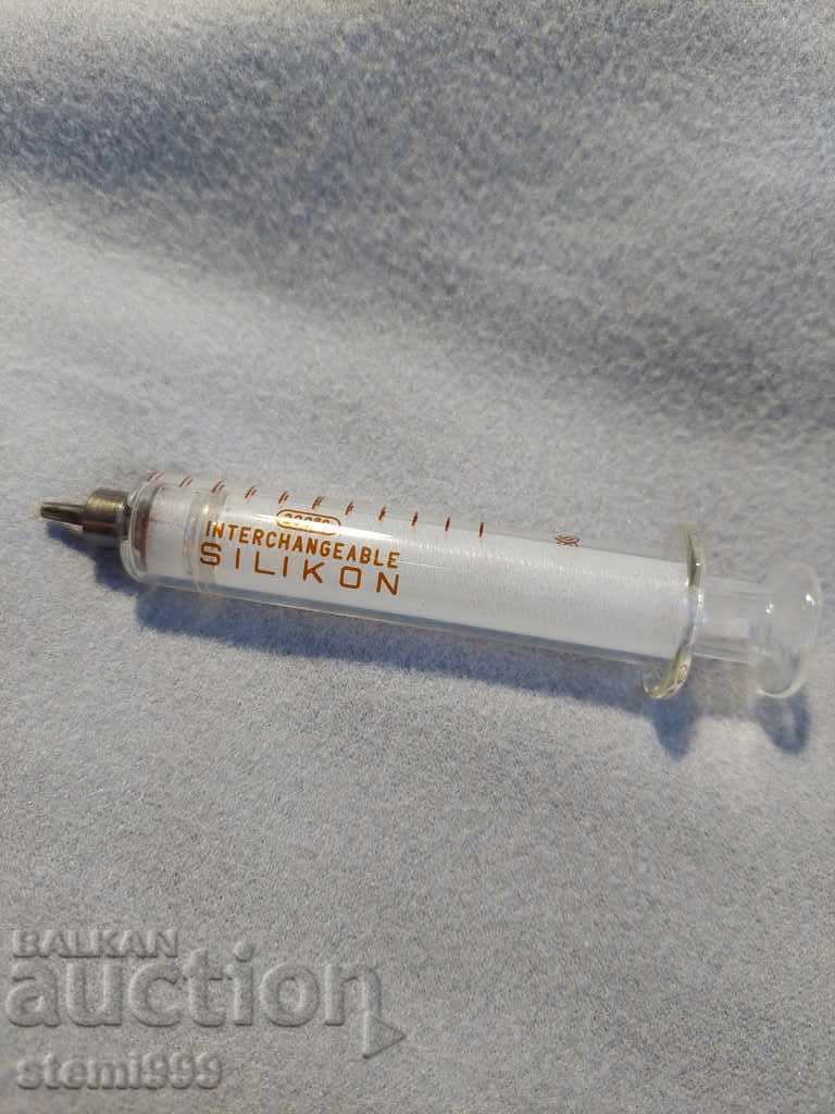 Old glass syringe