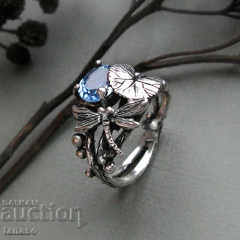 Retro ring with blue topaz, leaf appliques, butterfly