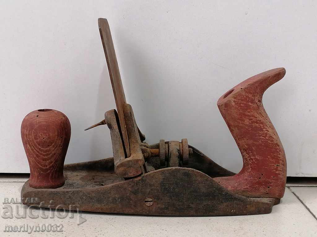 Auction An old woodworking planer with a knife Auction An old woodworking planer with a knife