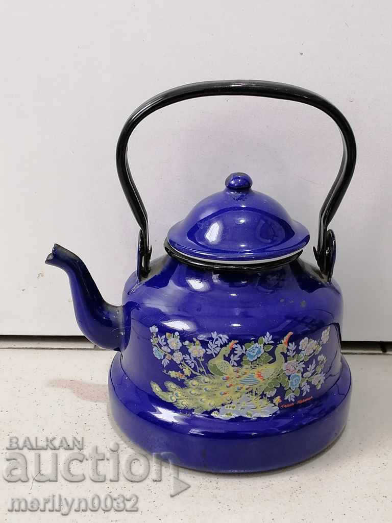 Enameled painted teapot from the saucepan dish with enamel jug pots