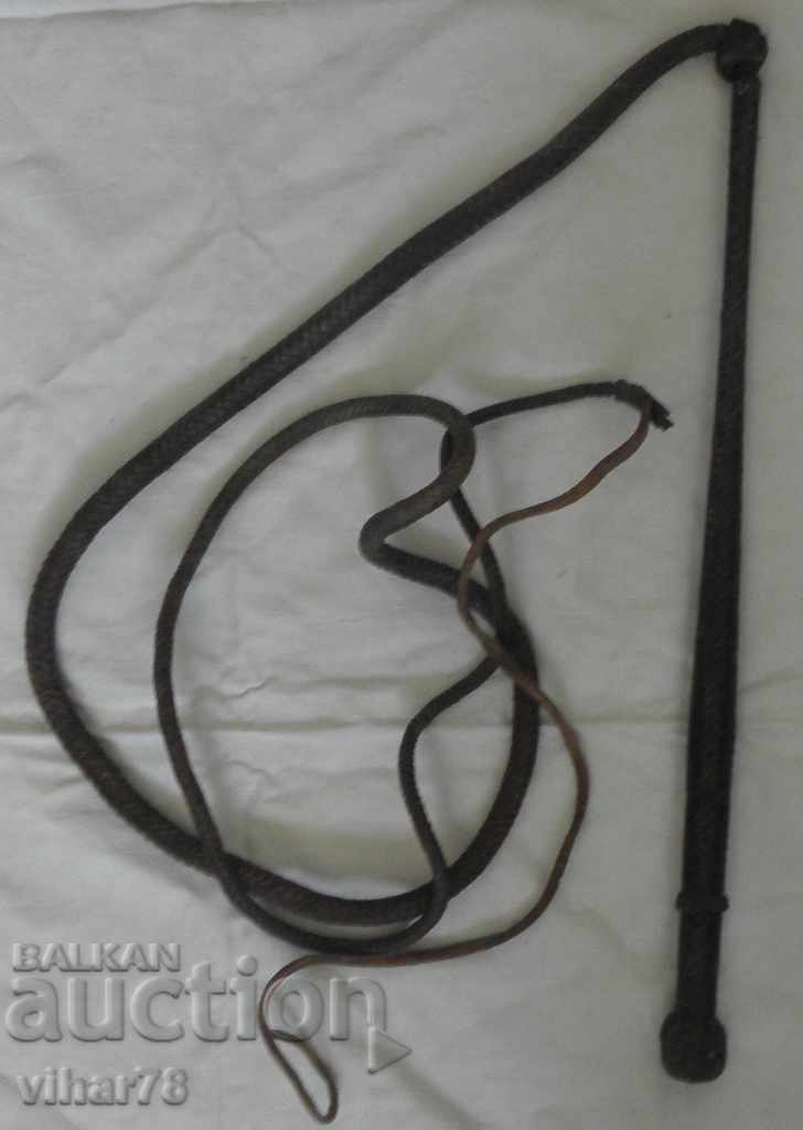 AN OLD LEATHER WHIP