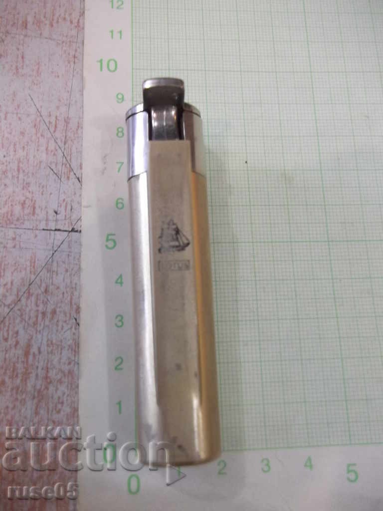 Auction  "LOTUS" piezocrystal lighter with soft flame working