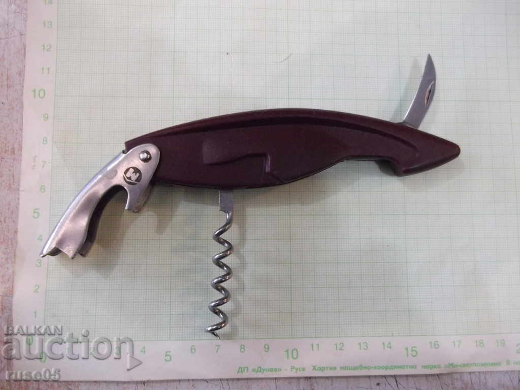 Corkscrew "M" with printing device and decapsulator