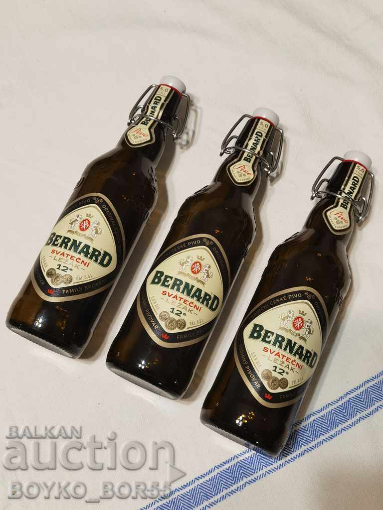 Three Empty Collectible Beer Glass Bottles