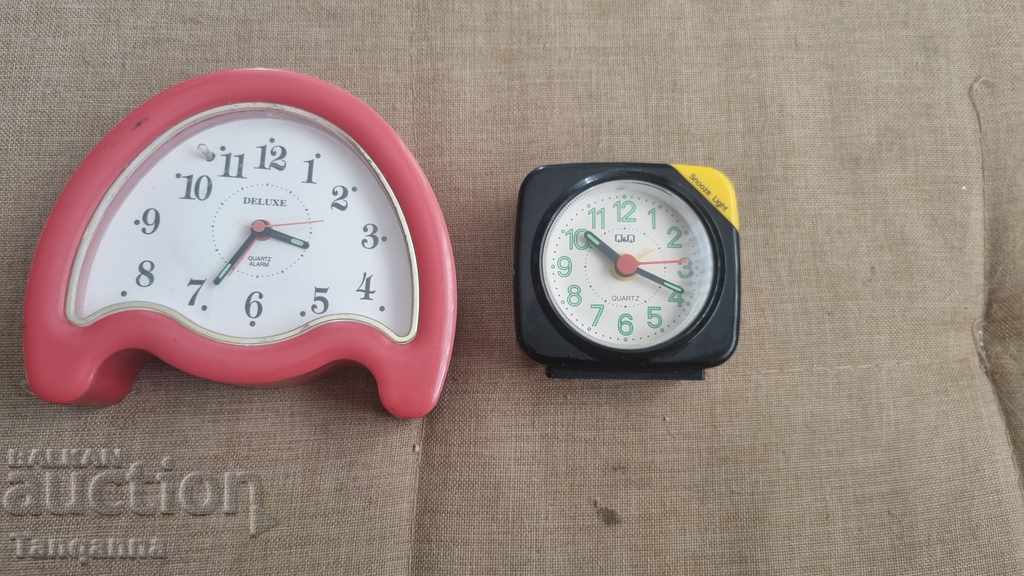 Two alarm clocks