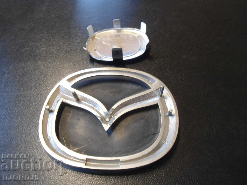 MAZDA emblems with price 4.00 BGN | € 2.05 MAZDA emblems with price 4.00 BGN | € 2.05