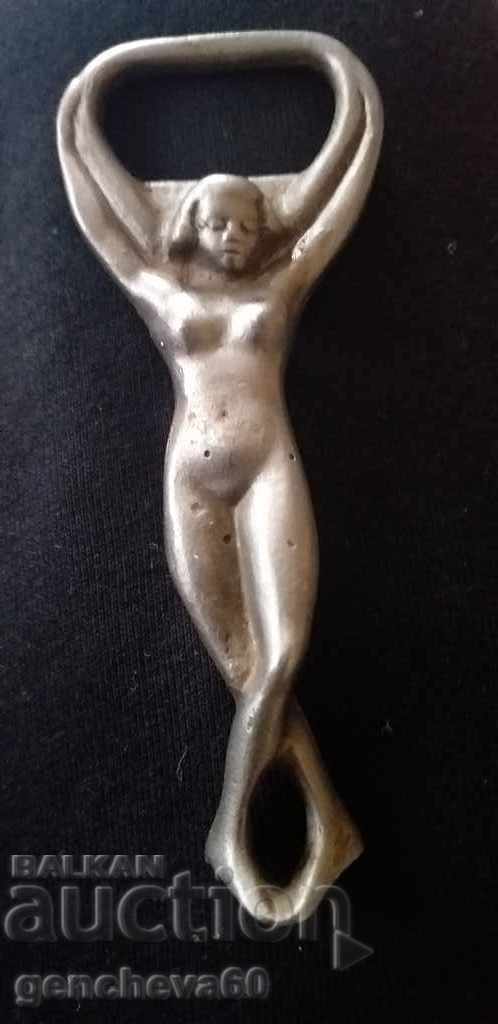 Old erotic metal opener Old erotic metal opener