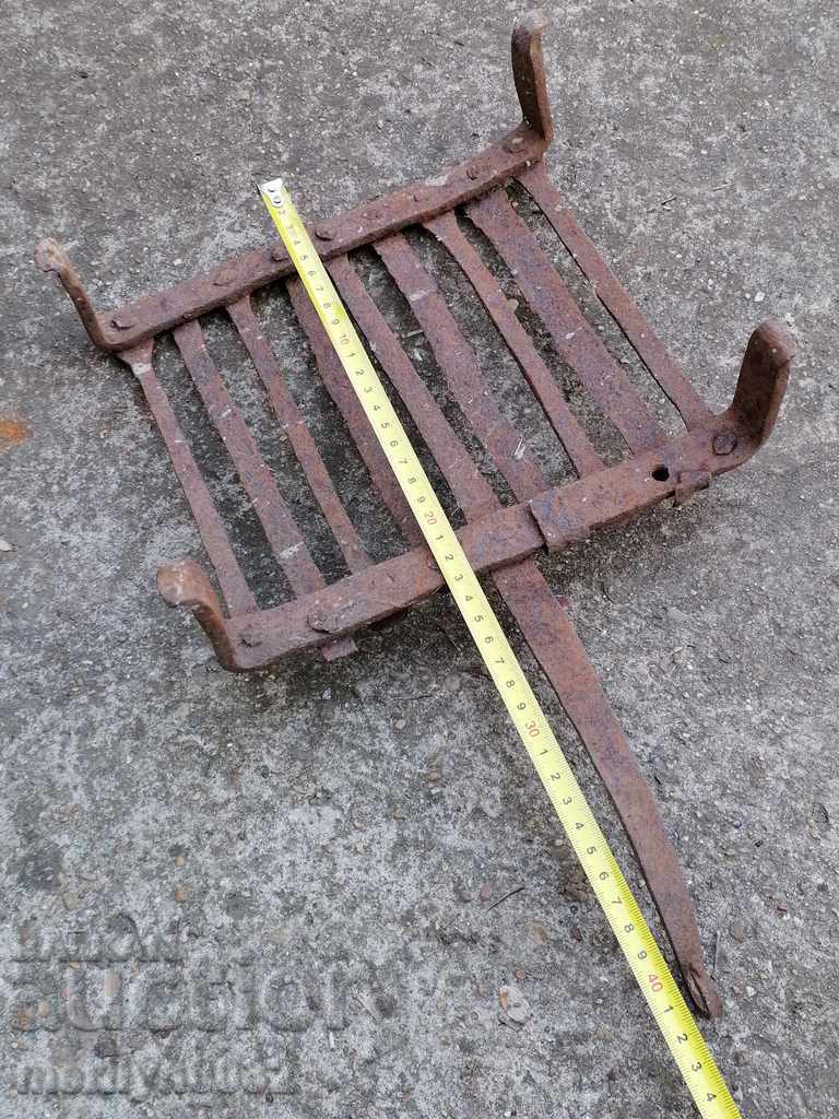 An old hand-forged grill, a steak, wrought iron - 5 An old hand-forged grill, a steak, wrought iron - 5