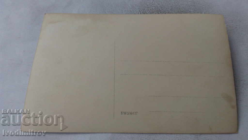 Photo of a man and two young girls in front of a boat on the shore with price 2.45 BGN | € 1.25 Photo of a man and two young girls in front of a boat on the shore with price 2.45 BGN | € 1.25