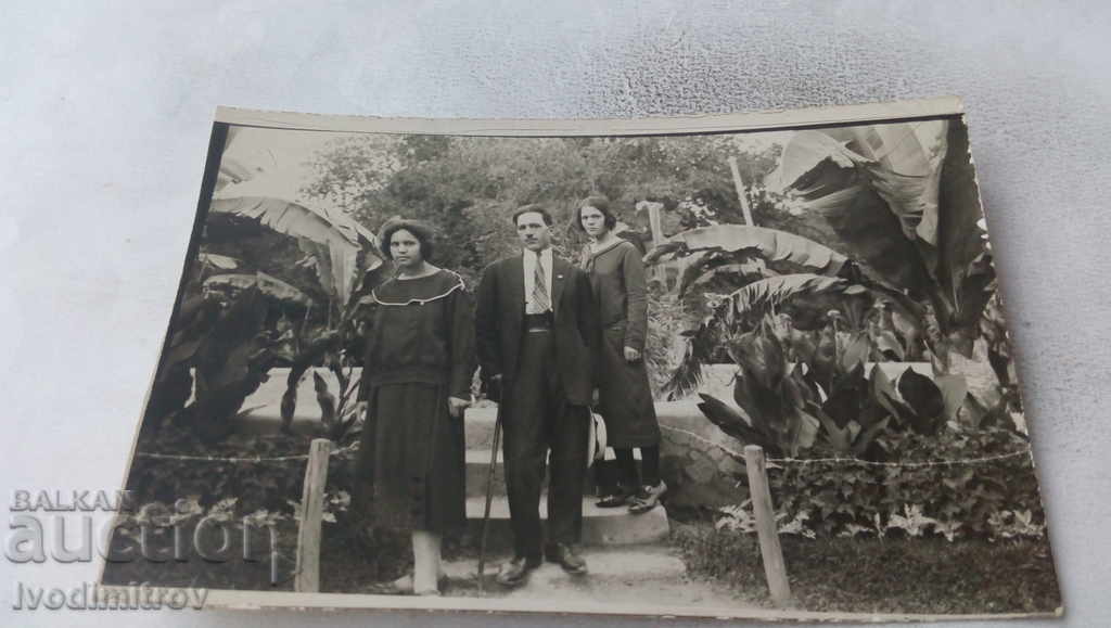 Photo of a man and two young girls in the Sea Garden