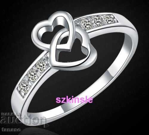 Ring of two hearts with zircons, silver-plated with price 20.00 BGN | € 10.23 Ring of two hearts with zircons, silver-plated with price 20.00 BGN | € 10.23