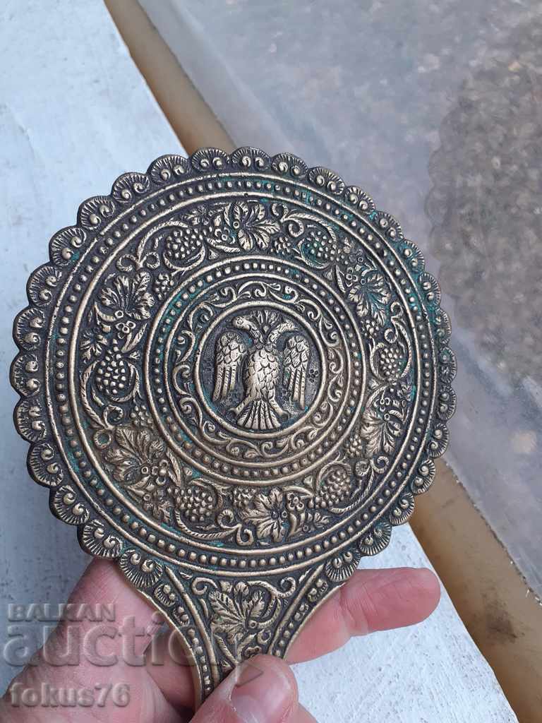 Old bronze mirror with double-headed eagle