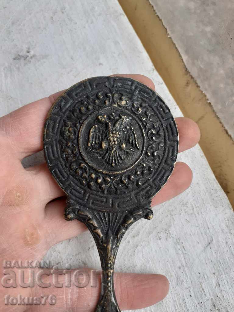 Delivery of Old bronze little mirror with a double-headed eagle