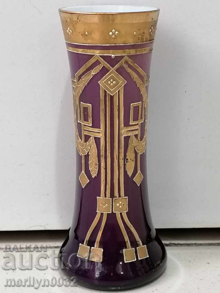 Old vase purple glass with hand-painted gilding