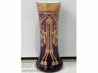 Old vase purple glass with hand-painted gilding