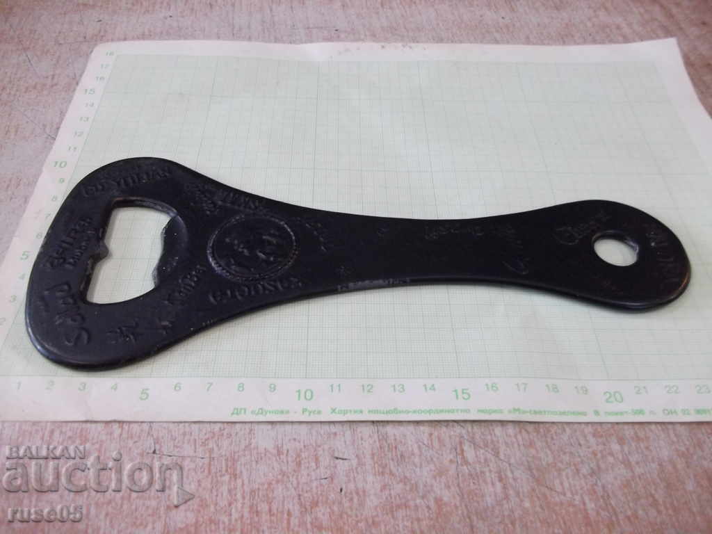 Auction  Bottle lid opener metal large