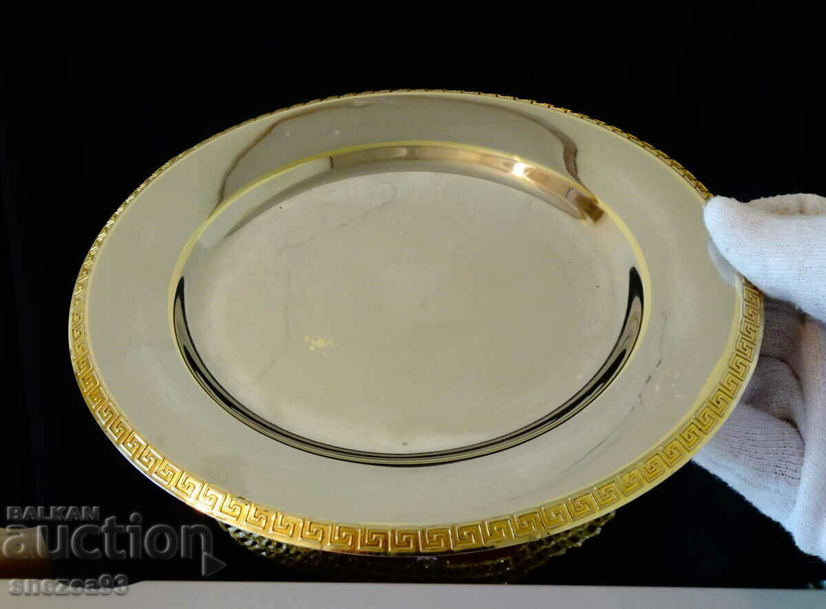Auction  Silver-plated Versace plate, gilding.