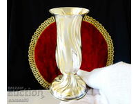 Silver-plated vase, cup, napkin.