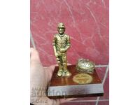 Bronze sculpture Miner with pyrite I think is the stone.