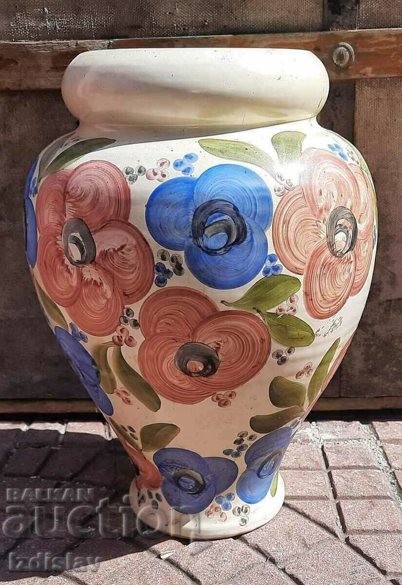 Hand painted ceramic vase.