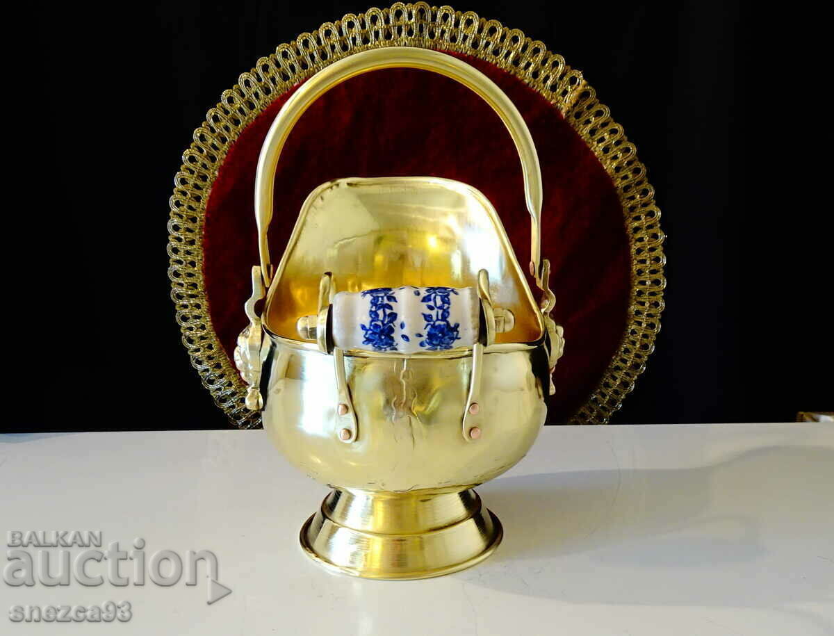 Auction  Antique brass vessel, lion heads, porcelain.