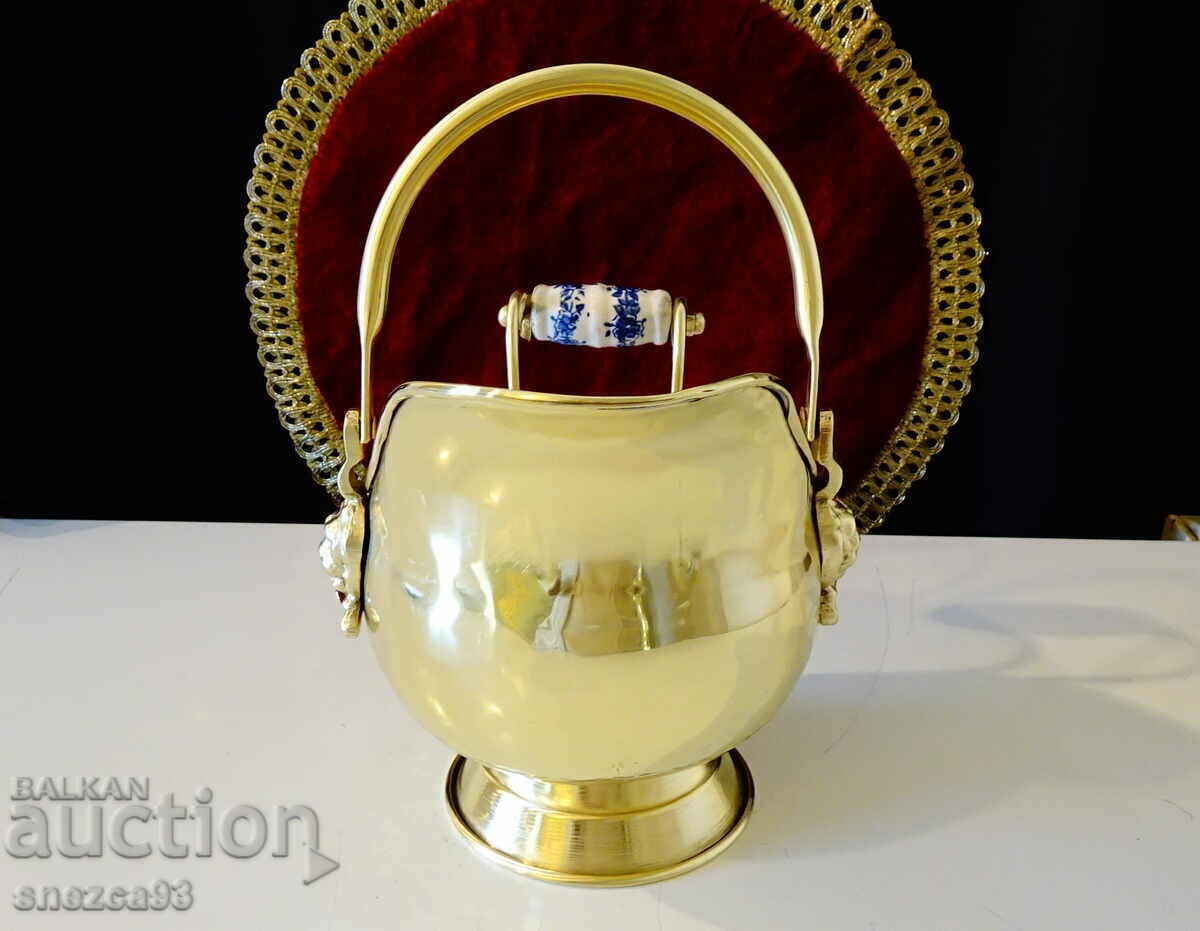 Delivery of Antique brass vessel, lion heads, porcelain.