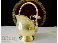 Antique brass vessel, lion heads, porcelain.