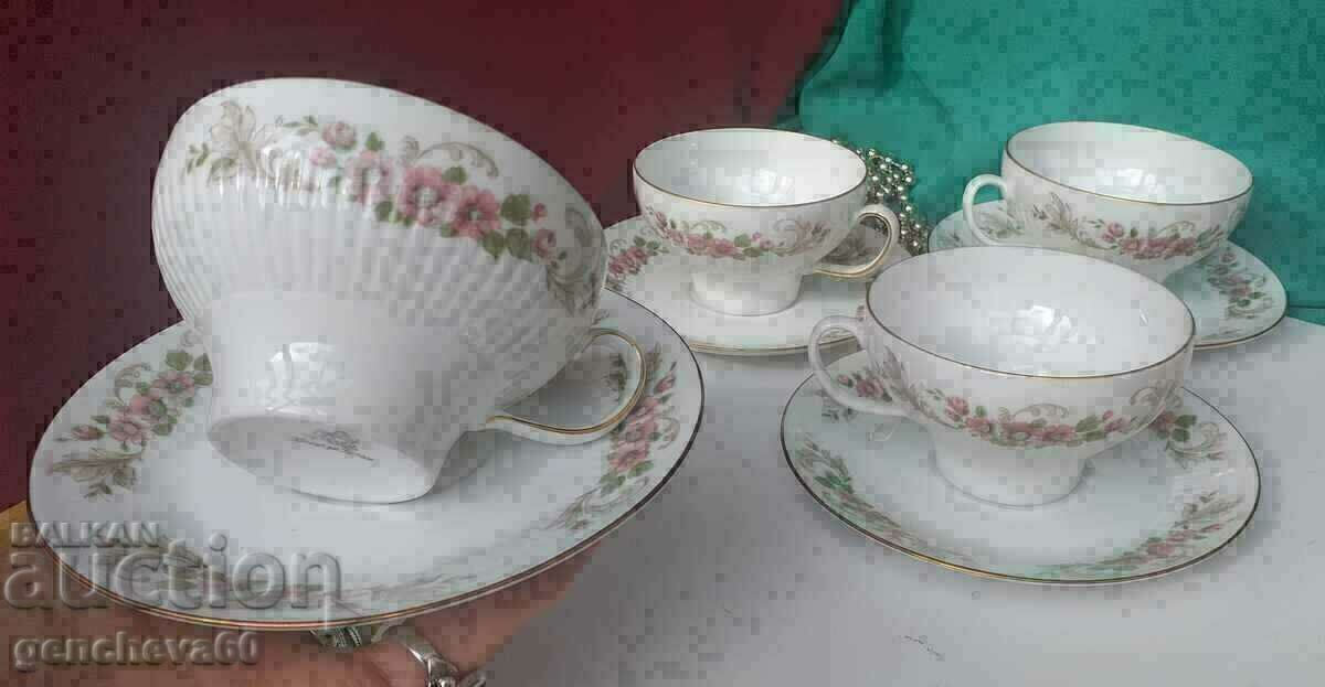 Royal set of tea cups with floral motifs