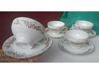 Royal set of tea cups with floral motifs