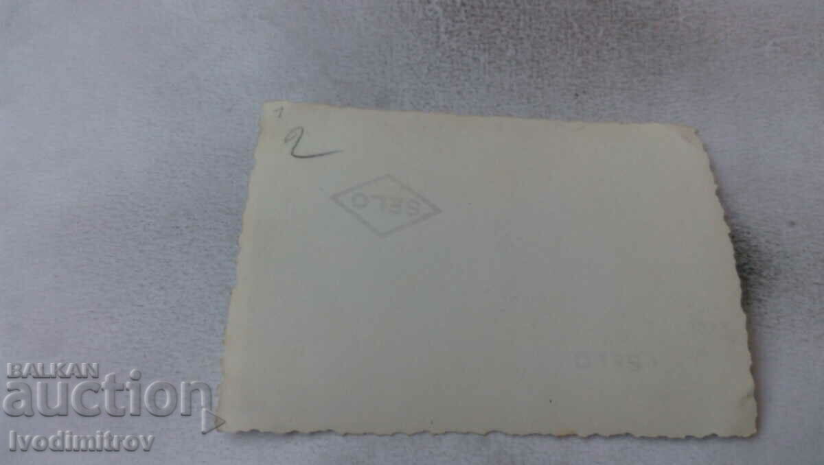 Photo Officer with friends on the lawn with price 1.15 BGN | € 0.59 Photo Officer with friends on the lawn with price 1.15 BGN | € 0.59